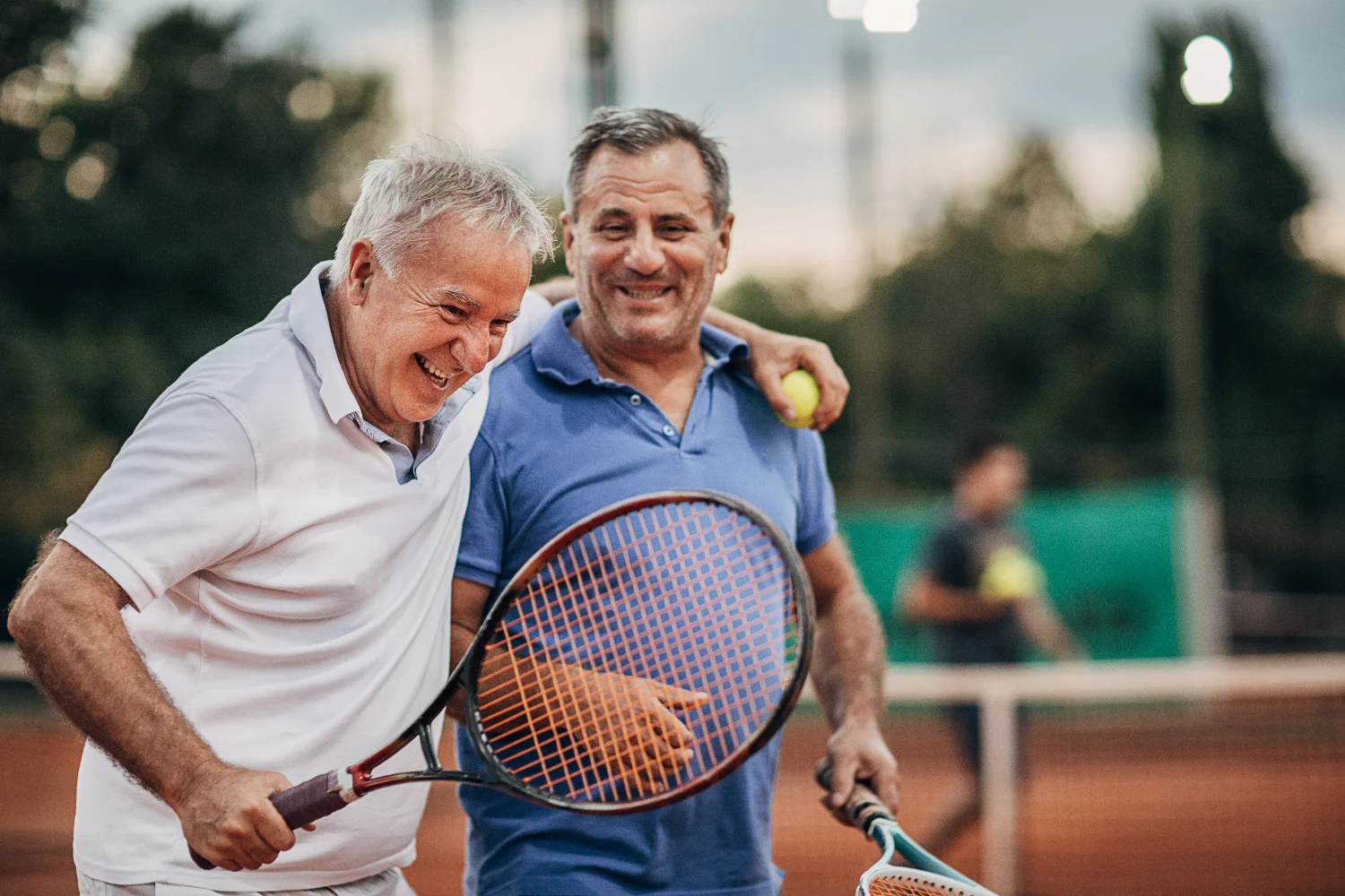 two friends playing tennis