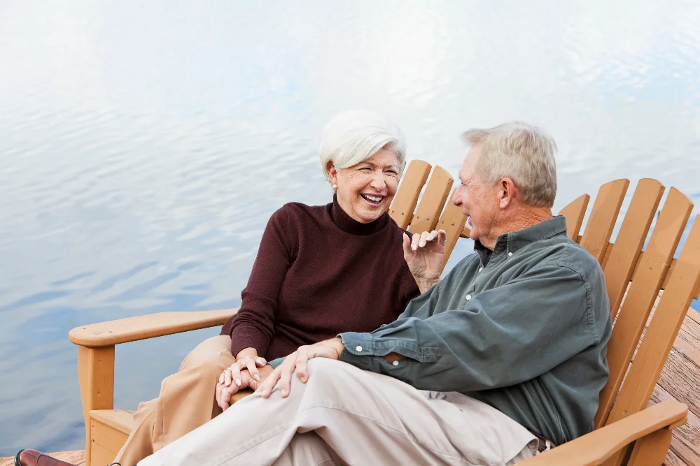 couple sitting on a dock